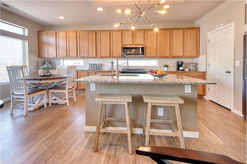 Gourmet Island Kitchen with Walkout Dining Area