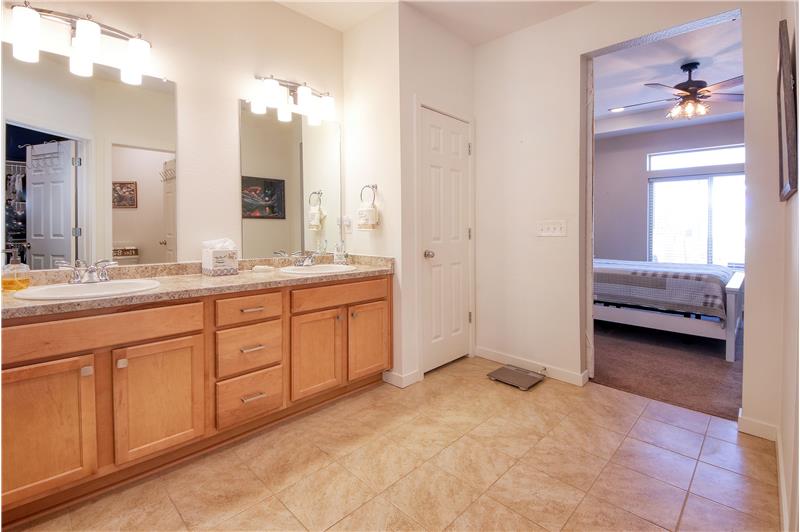View of the Primary Bedroom from the Master Shower Bathroom