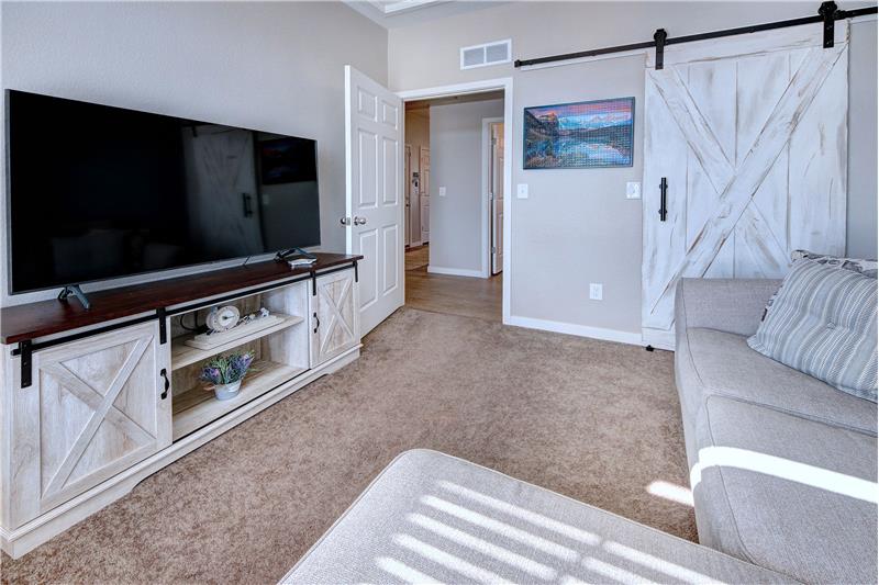 Bedroom #2  with Barn Door into Full Hall Bathroom