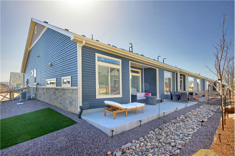 Backyard and Sideyard with Auto Sprinklers, Patio, and Rock Gardens