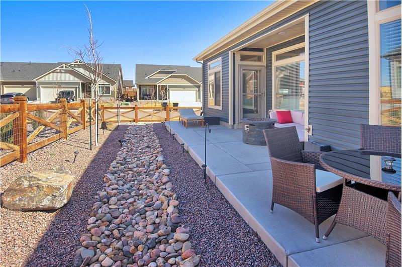 Fenced Lot with Rock Gardens and Expanded Patio