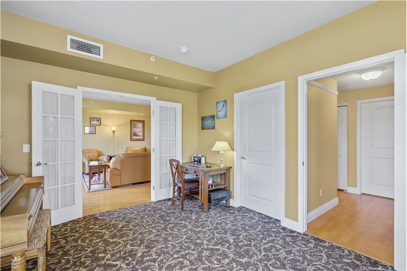 With its walk-in closet and French doors, den could be a 3rd bedroom