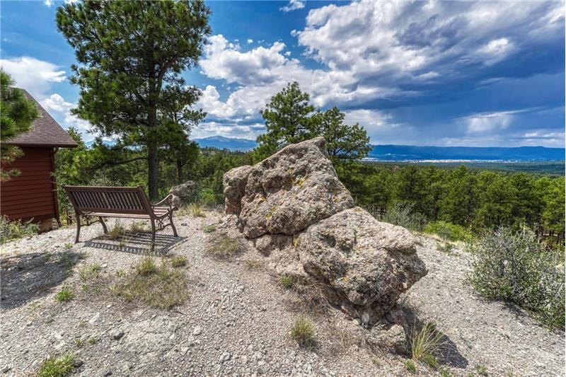 Perched high above Colorado Springs offering breathtaking 360-degree views of the city skyline, mountains, & iconic Pikes Peak