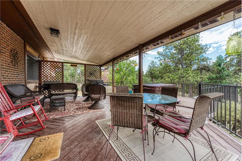 Covered deck off the Dining Nook for outdoor dining and relaxation.