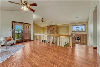 French doors lead to an outdoor deck where you can enjoy the Colorado sunshine.