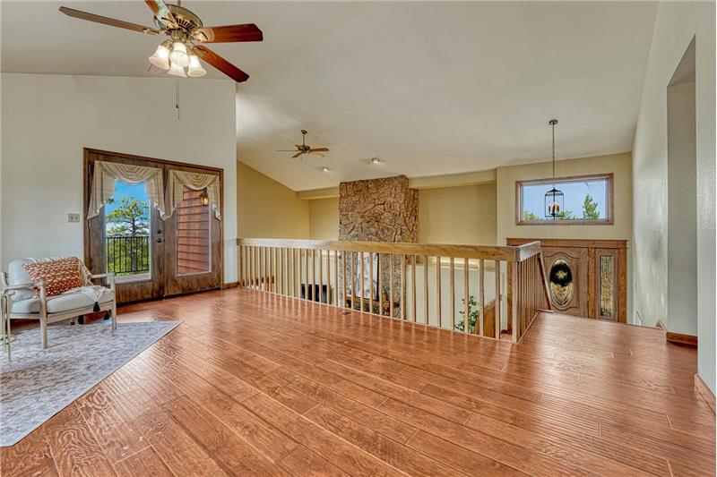 French doors lead to an outdoor deck where you can enjoy the Colorado sunshine.