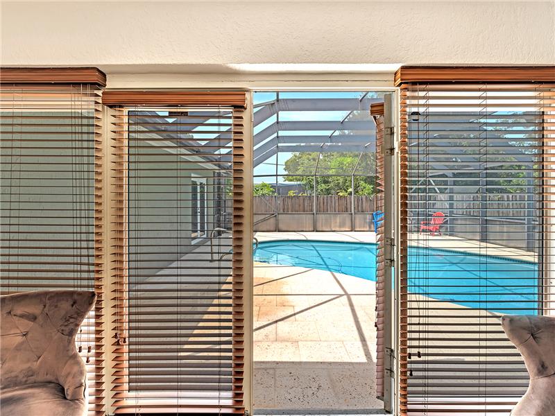 Double Glass Doors open to Pool and Patio 