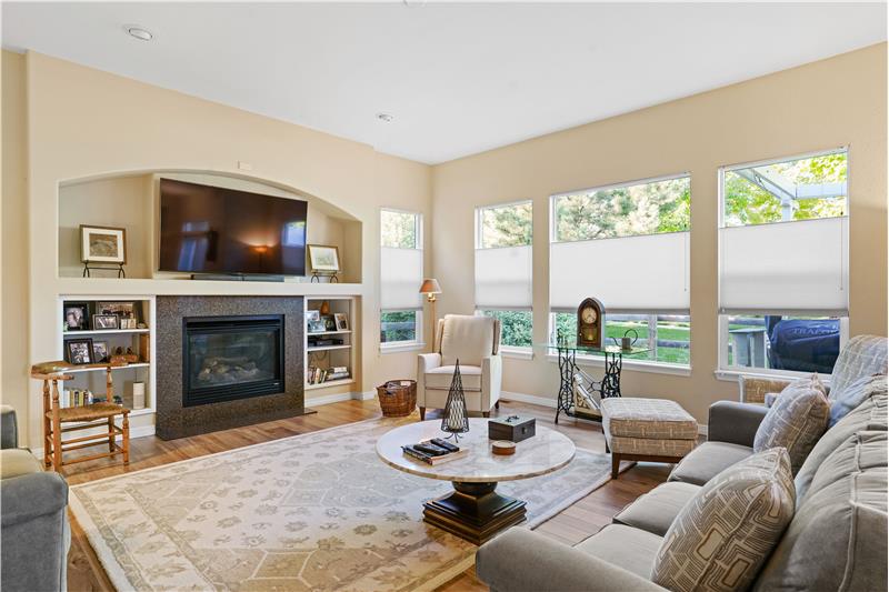Note the top-down/bottom-up cellular shades throughout this home.