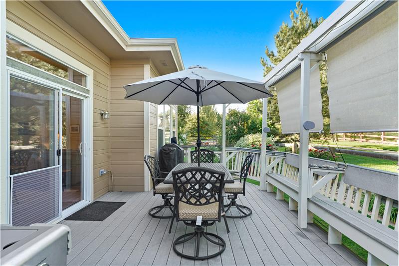 The west-facing 13'x23' Trex deck has built-in seating and shading.