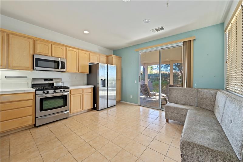 Big Kitchen with Tiled floors and Slider to patio