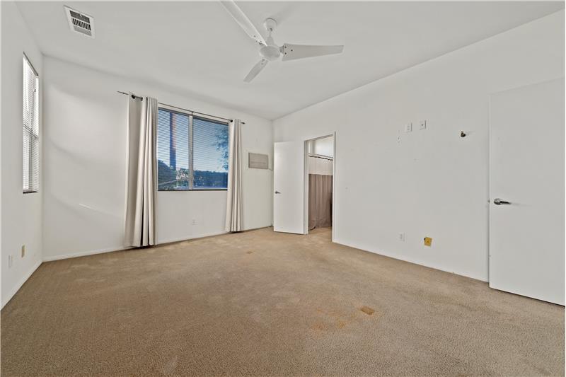 Primary Bedroom has Evaporative cooler