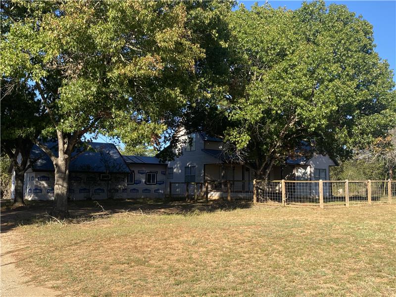 Nestled in the trees for shade during the summer