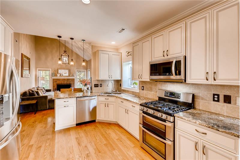 Kitchen features stainless steel LG appliances, just three years old, all of which convey.