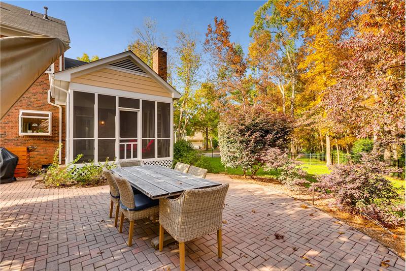 Expansive, brick paved patio perfect for al fresco dining and outdoor entertaining.