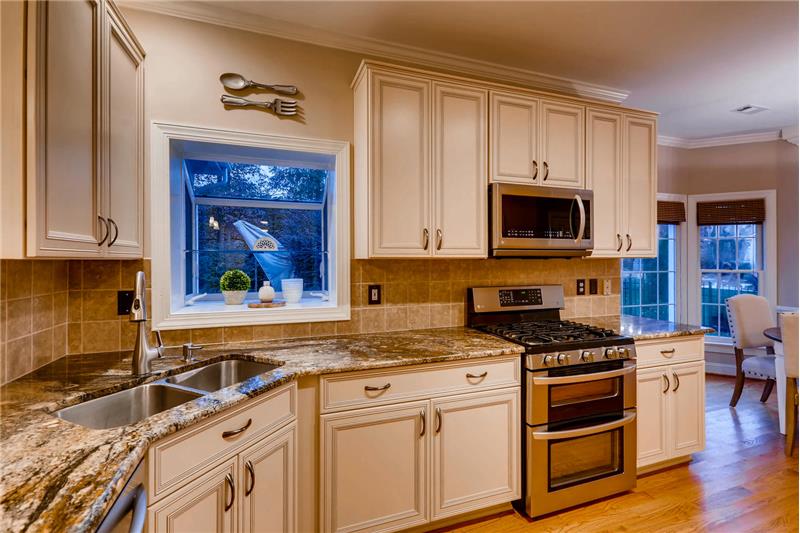 Kitchen offers plenty of storage and counter space.