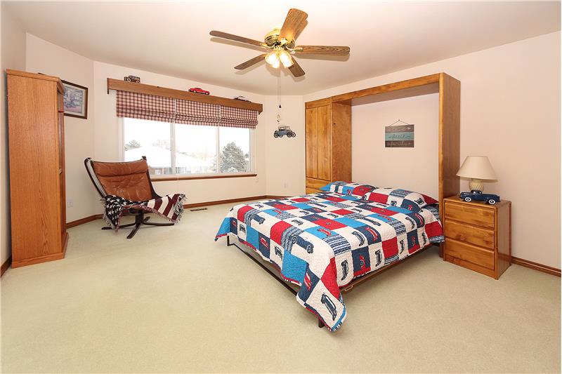 Bedroom 3 with a ceiling fan