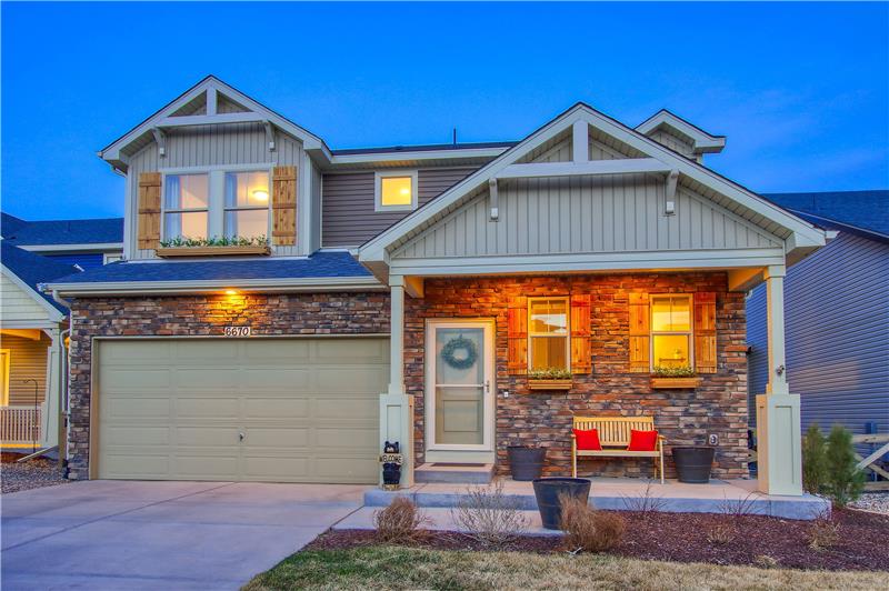 Sunset Views of the Front of the House and Covered Front Porch