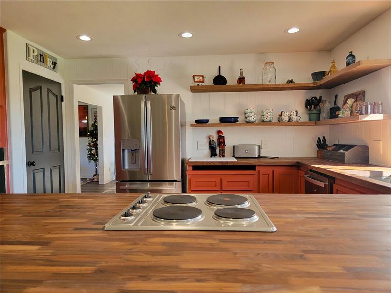 Today's creative Open Shelving Concept is paired with the gorgeous custom Black Walnut Butcher Block Countertops!