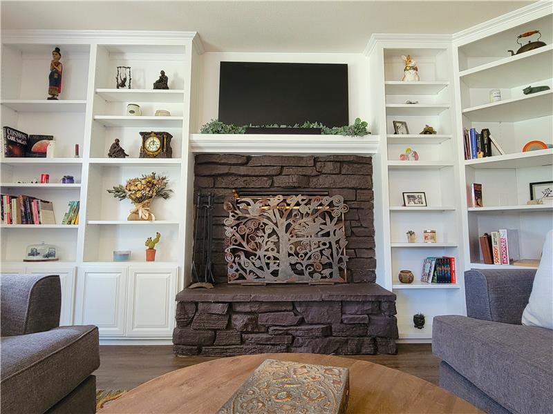 The Pinnacle of the Great Room, the Stone Fireplace, the source of warmth, and many future memories.
