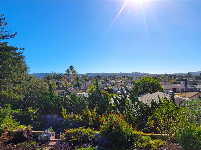 In the background is the hills of Orcutt; in the foreground is the lower level Garden.
