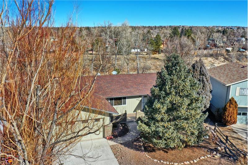 Aerial view of property backing to Cottonwood Creek greenbelt.