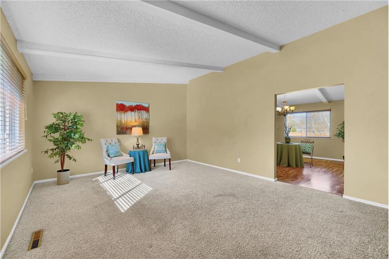 Formal Living Room into Formal Dining Room and Kitchen.