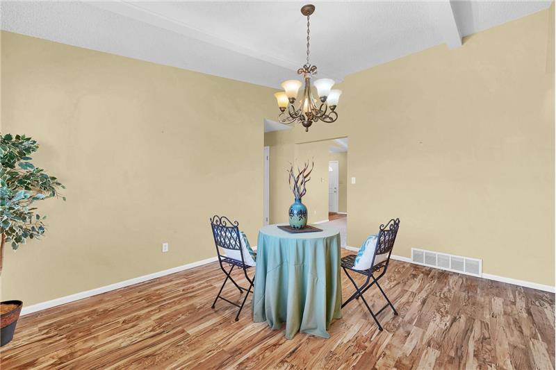 Formal Dining Room with view to the Entry and formal Living Room.