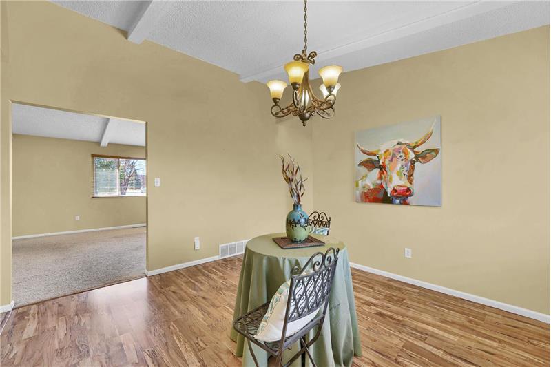 Formal Dining Room with view into the formal Living Room.