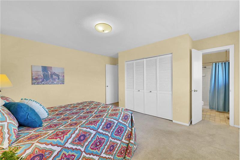 Master Bedroom into the adjoining three quarter Master Bathroom.