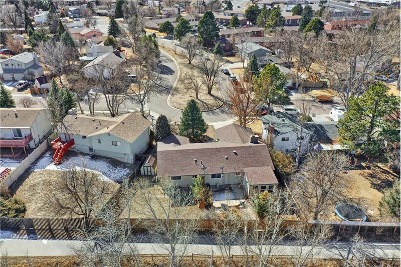 Aerial view of where the home sits on the cul-de-sac and backs to the Cottonwood Creek and trails.