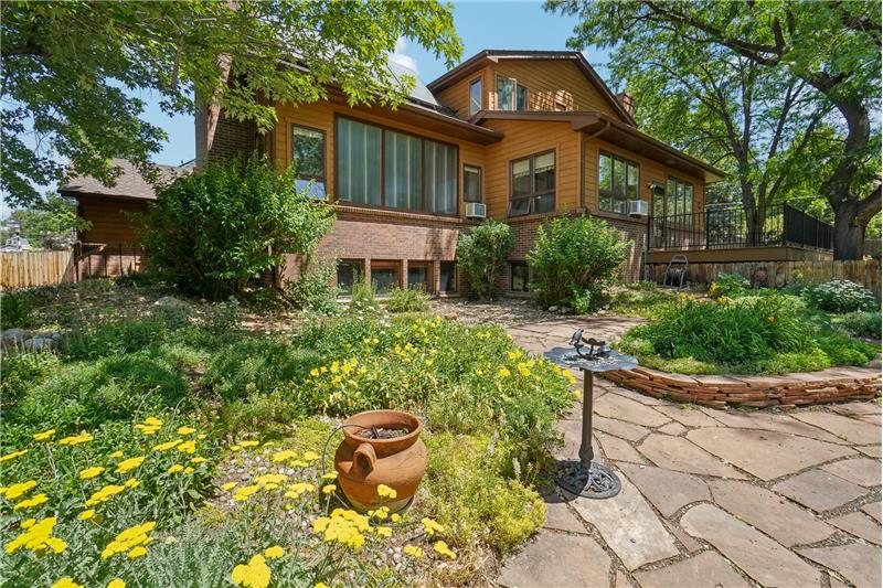 Side yard with lots of perennials (note solar wall)