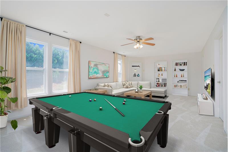 Oversized 369 square foot bonus/recreation room at the top of the second floor. Virtually staged to show potential.