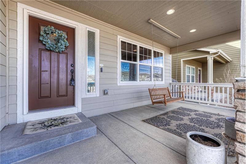 Covered front porch to enjoy the Colorado sunshine.