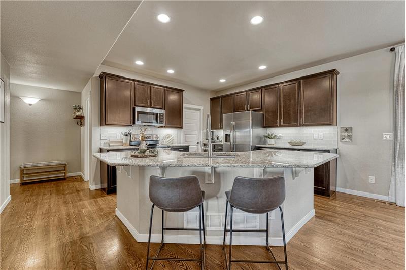 Breakfast bar for informal dining and conversations with the chef.