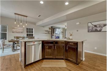 The Kitchen overlooks the Dining Area and Living Room.