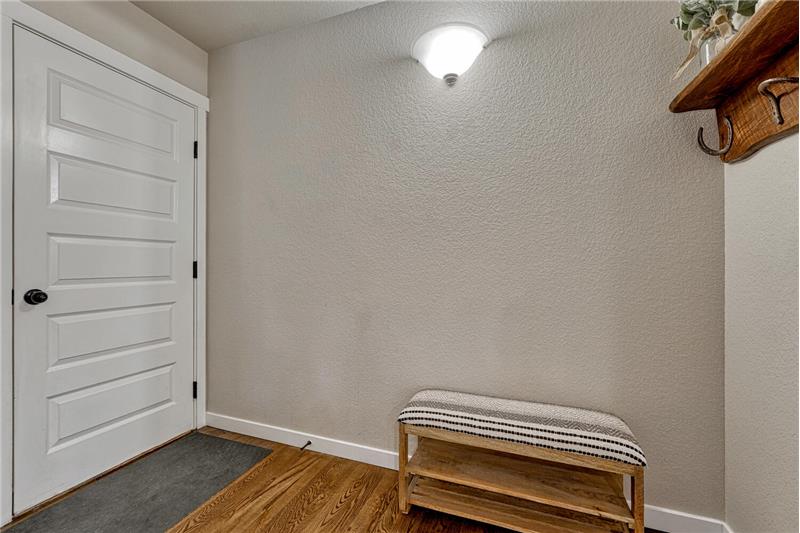 Mudroom with access to the 4-car garage.