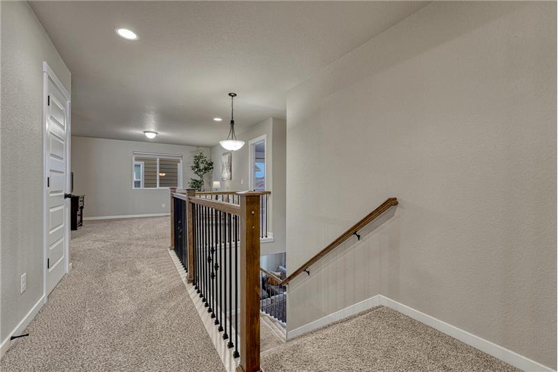 Upper level hallway to the spacious Loft.