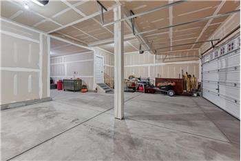 4-car attached garage with door opener.