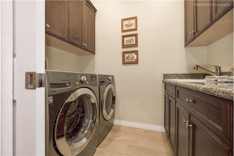 Laundry Room with Sink and Estra Cabinets