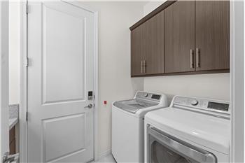 Full Laundry Room With Sink