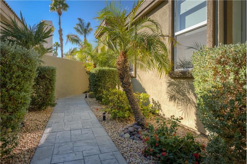 Manicured Front gated courtyard