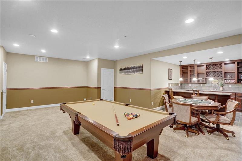 Basement Rec Room with pool table, game table and wet bar