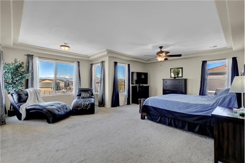 Upper Level Primary Bedroom with Sitting Area and Pikes Peak Views