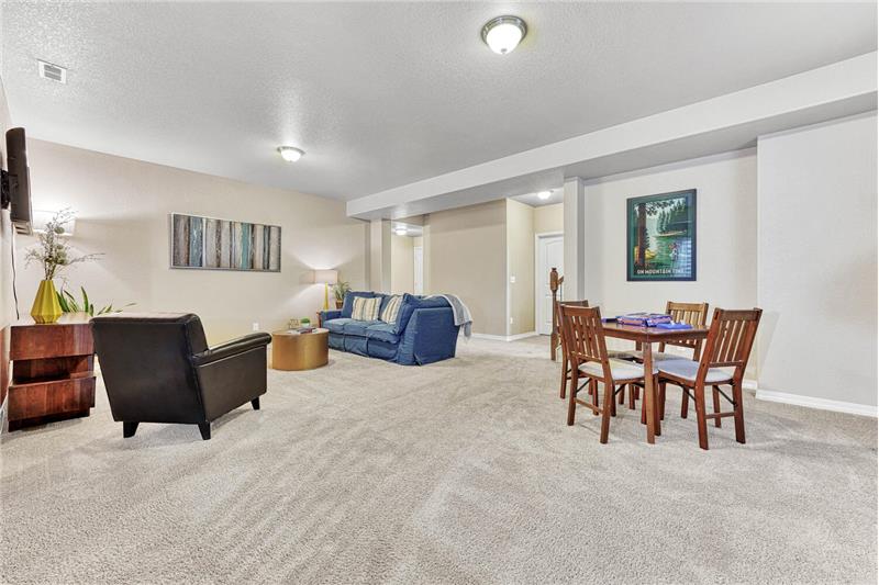 Spacious rec room in basement with many different areas!