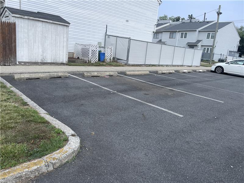 When facing the parking lot the parking spot is the  2nd spot on the left