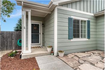 Covered front porch and flagstone patio.