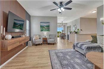 Fabulous accent wall with wood elements and floating console.