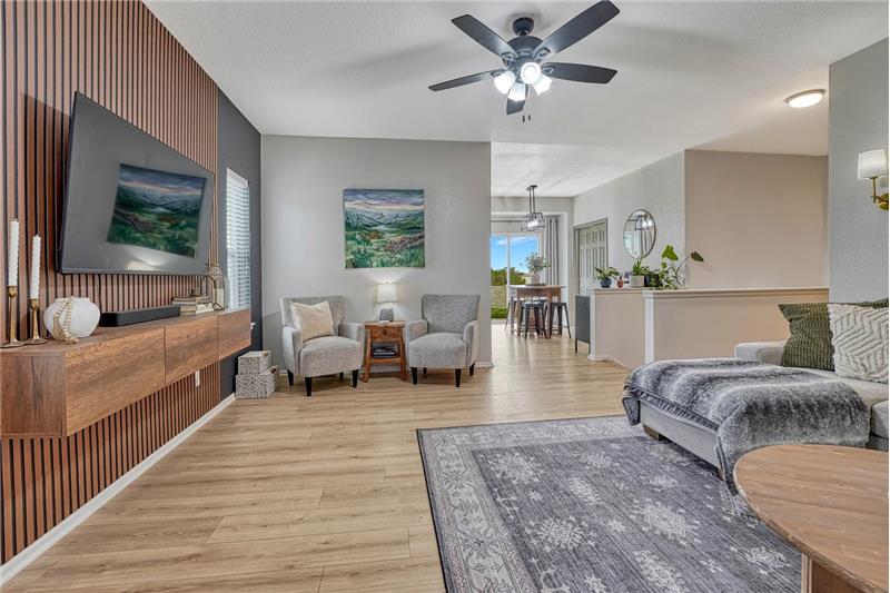 Fabulous accent wall with wood elements and floating console.