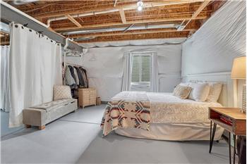 Easily create an additional bedroom in the unfinished basement.