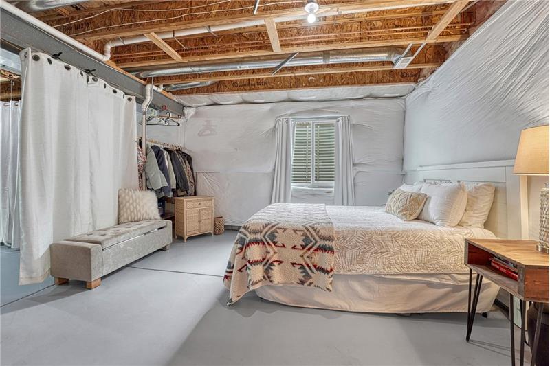 Easily create an additional bedroom in the unfinished basement.
